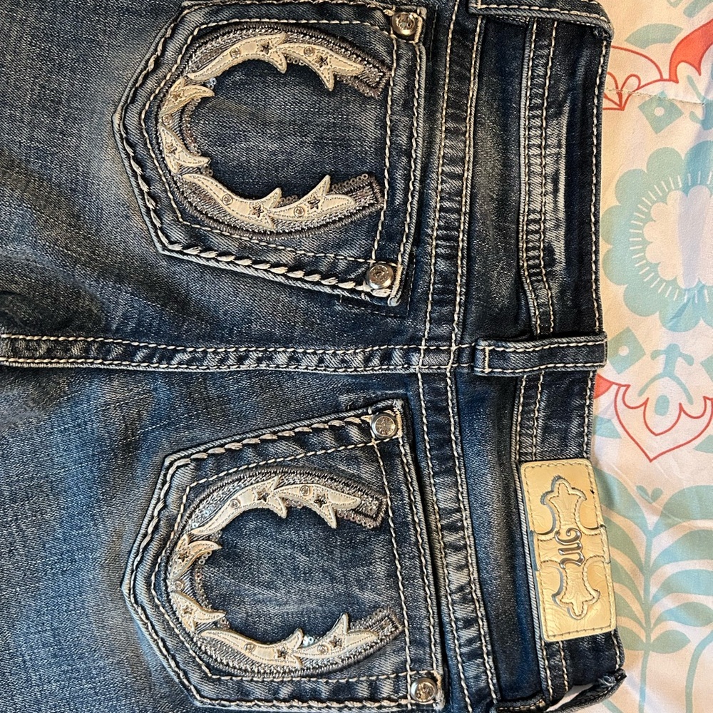 Size 25x34 Miss Me bootcut jeans. Perfect condition, worn once.